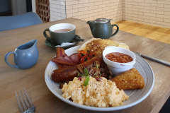 Hearty breakfast with hot brown water